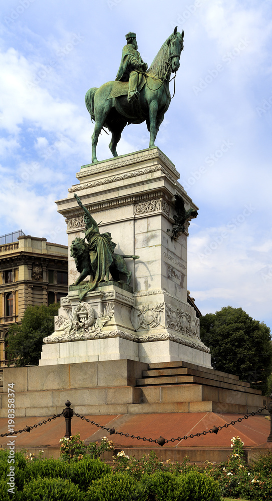 Italy, Milan historic quarter - via Dante street - Largo Cairoli roundabout and Giuseppe Garibaldi monument Italy, Milan historic quarter - via Dante street - Largo Cairoli roundabout and Giuseppe Garibaldi monument
