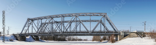 Railway bridge over the winter river
