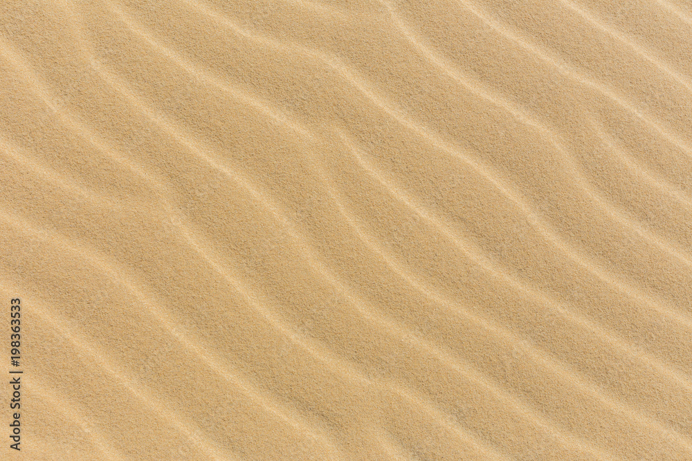Sand on the beach as background, Texture, Pattern Sand on the beach as background, Texture, Pattern
