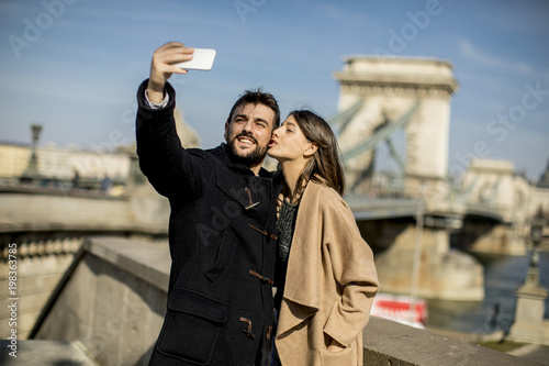 Photography Portrait of loving couple taking selfie