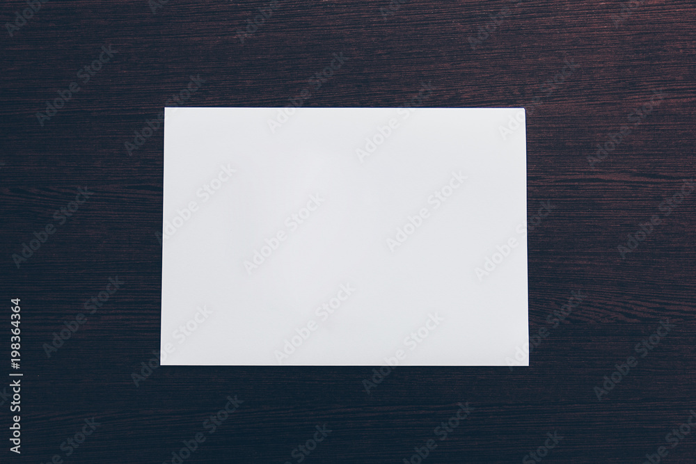 White list on a wooden table. Background and mock-up White list on a wooden table. Background and mock-up