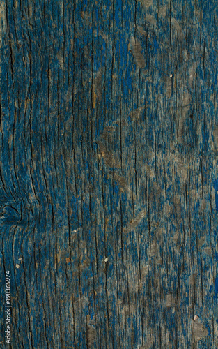 Old wooden background with a pattern, worn, painted with paint very old, woodcarving, medieval, texture, background, ancient,blue