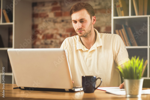 Young man with a laptop