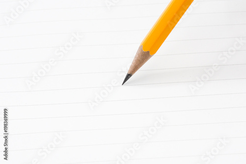 close up of pencil writing on a paper - for business concept © sema_srinouljan