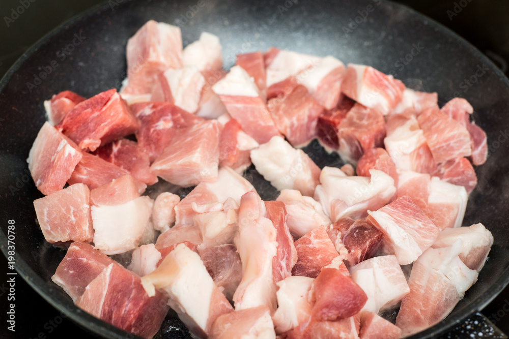 Red meat on a frying pan Red meat on a frying pan