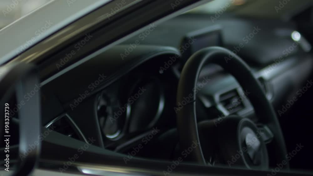 PAN of interior of empty car in parking lot PAN of interior of empty car in parking lot