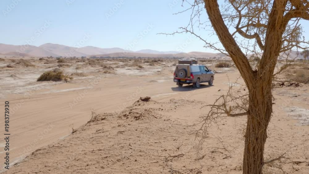 Exploring adventure four wheel drive through desert in Namibia Africa