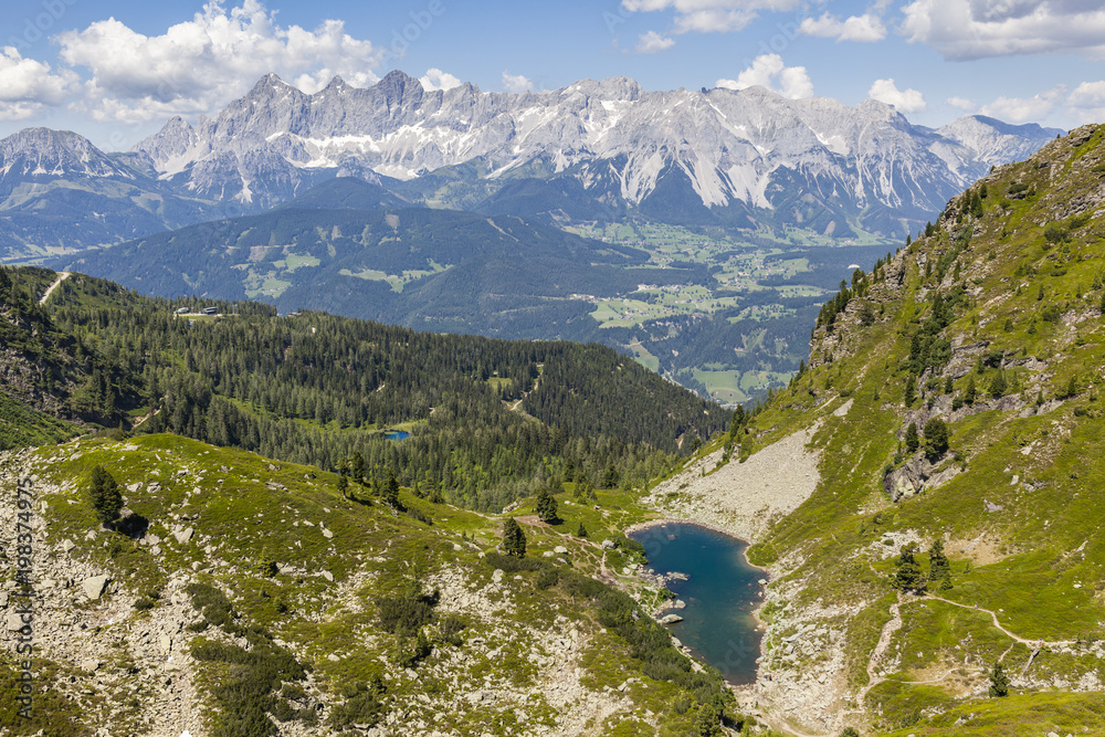 View from Rippetegg to lake Mittersee Spiegelsee and mountain Dachstein