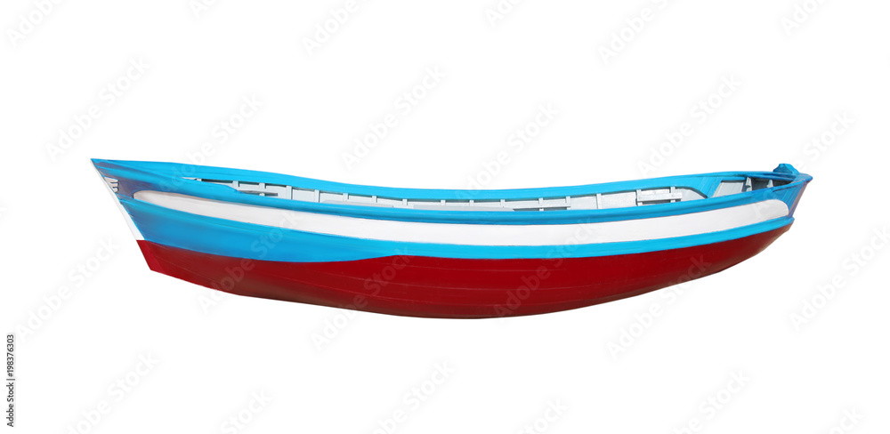 Wooden painted boat isolated on a white background Wooden painted boat isolated on a white background