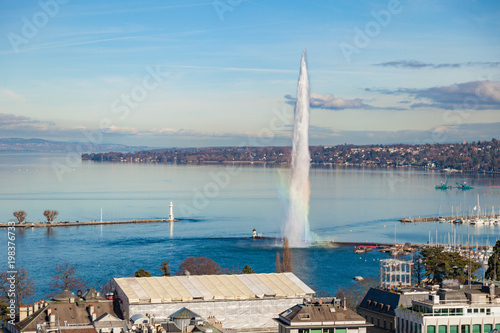 View of the water jet fountain with rainbow in the lake of Geneva and the cityscape of Geneva, Switzerland