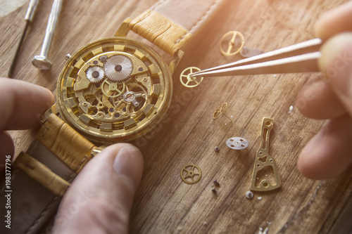 Process of installing a part on a mechanical watch, watch repair
