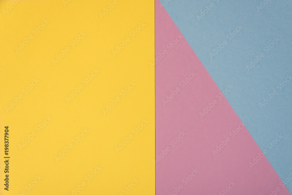 Colorful soft yellow, light blue and purple paper background. Colorful soft yellow, light blue and purple paper background.