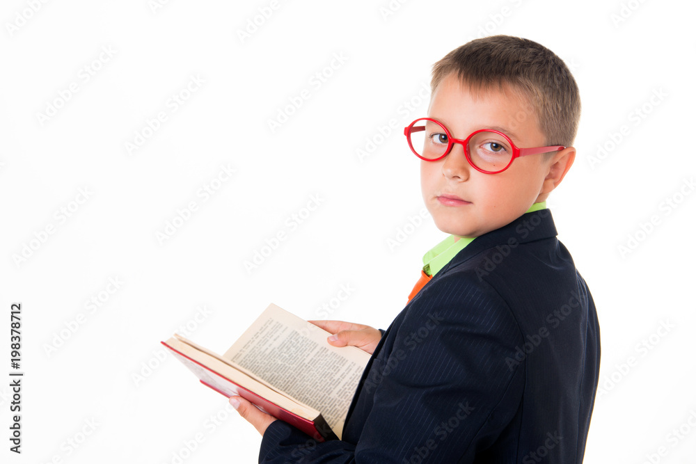 Boy reading a book thirsty for knowledge - isolated over a white background Boy reading a book thirsty for knowledge - isolated over a white background