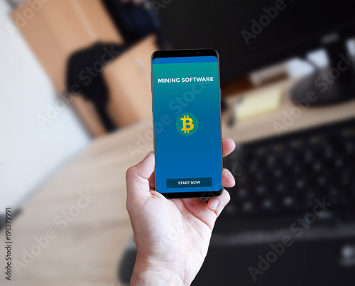 Man using smart phone with interface app on screen for mock up presentation on custom background
