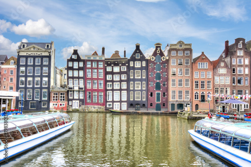 Buildings on Damrak canal, Amsterdam architecture, Netherlands