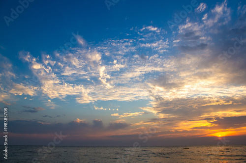 Amazing sea sunset, the sun, waves, clouds