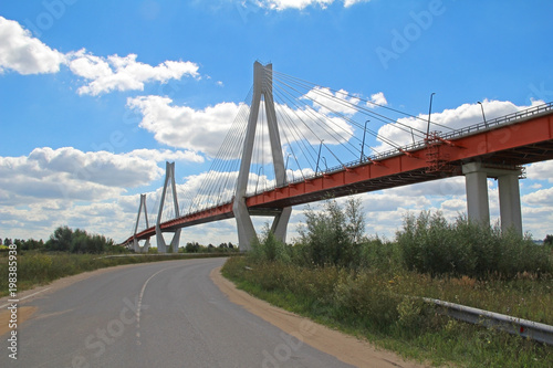 Summer landscape with a view of the cable-stayed bridge on the river Oka, Murom, Russia.