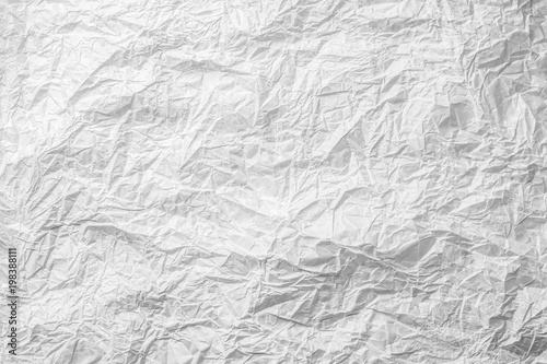 Background of crumpled white gray monochrome bakery paper photo