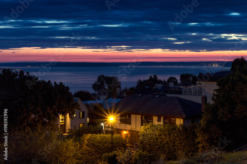 Street light  houses and sea view at sunset in Seattle   USA