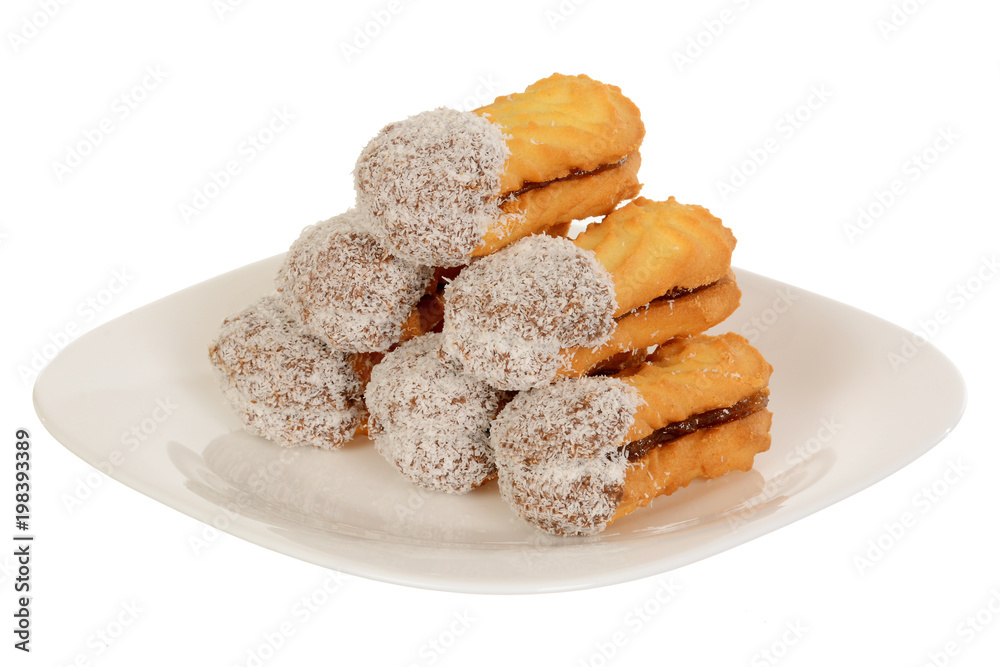 Sandwich cookies with coconut, oval shape filled with chocolate cream Sandwich cookies with coconut, oval shape filled with chocolate cream
