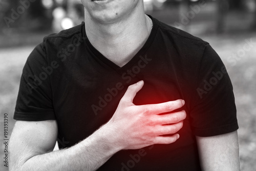 Outdoor portrait of a  man  with heart attack or broken heart