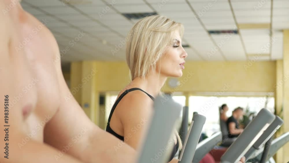 People training in fitness club People training in fitness club