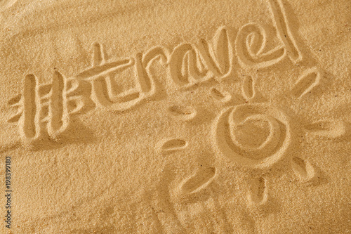 written words travel with sun sign and beam on sand of beach wave background