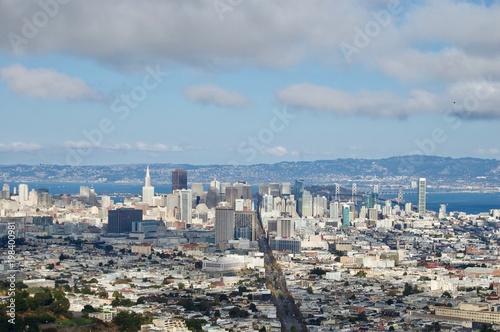 Beautiful aerial view from the San Francisco Twin Peaks overlooking the city's scenic skyline with numerous buildings and landmarks in the background - California, USA