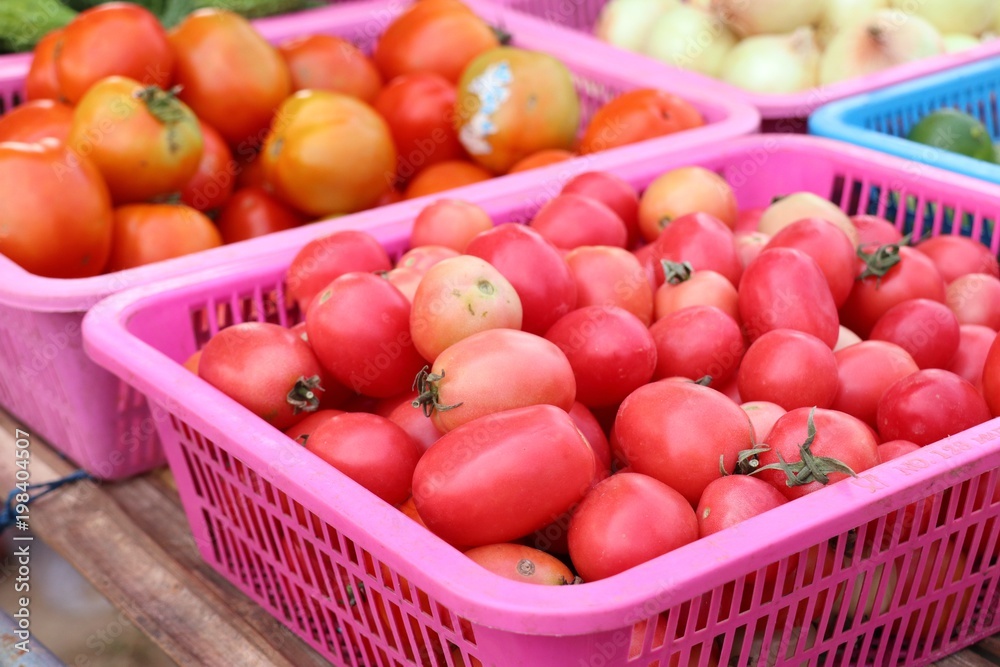 Fresh tomatoes in market Fresh tomatoes in market