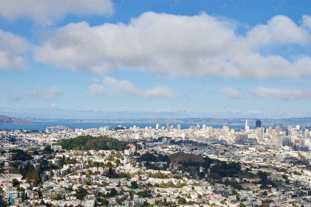 Beautiful aerial view from the San Francisco Twin Peaks overlooking the city's scenic skyline with numerous buildings and landmarks in the background - California, USA Beautiful aerial view from the San Francisco Twin Peaks overlooking the city's scenic skyline with numerous buildings and landmarks in the background - California, USA