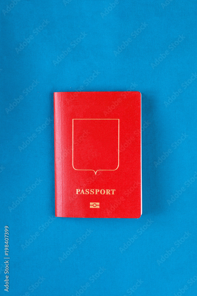 red passport on a blue background red passport on a blue background
