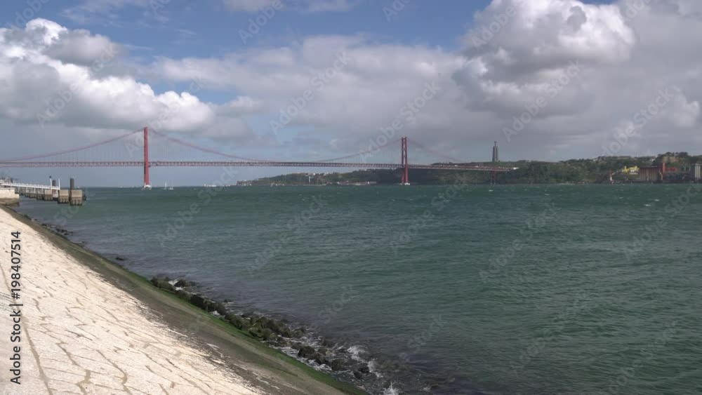25 de Abril Bridge seen from the river bank 25 de Abril Bridge seen from the river bank