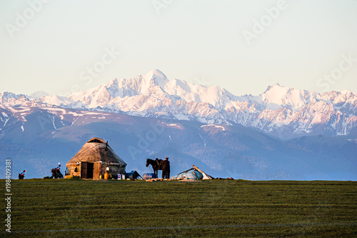 The herdsman's yurt at the meadow in morning, Kalajun grassland of Xinjiang