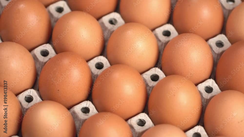 Uncooked eggs. Rotating and closeup Uncooked eggs. Rotating and closeup