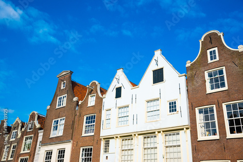 Fototapeta Naklejka Na Ścianę i Meble -  Famous facades of the beguinage in Amsterdam