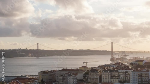 Timelapse of Tagus river with 25 de Abril Bridge photo