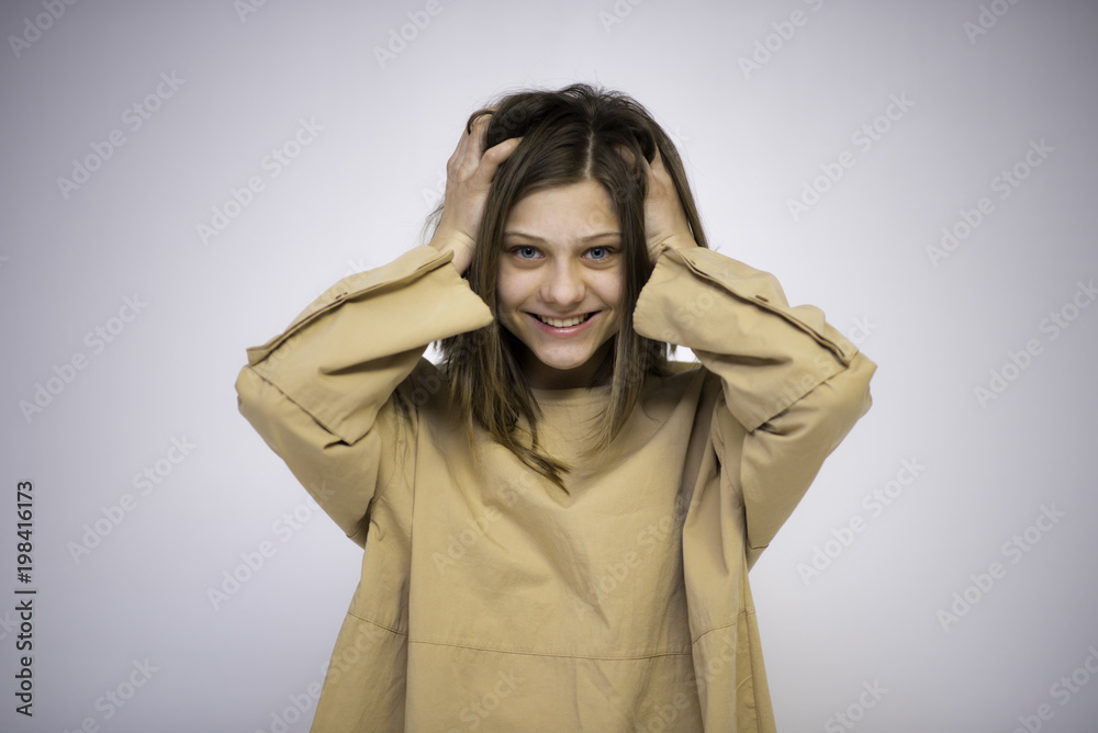 Cute young girl beautiful teenager in different clothes on different backgrounds in different poses showing different emotions Cute young girl beautiful teenager in different clothes on different backgrounds in different poses showing different emotions