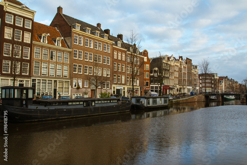 Historic buildings over the canals in the Old Town of Amsterdam. Netherlands