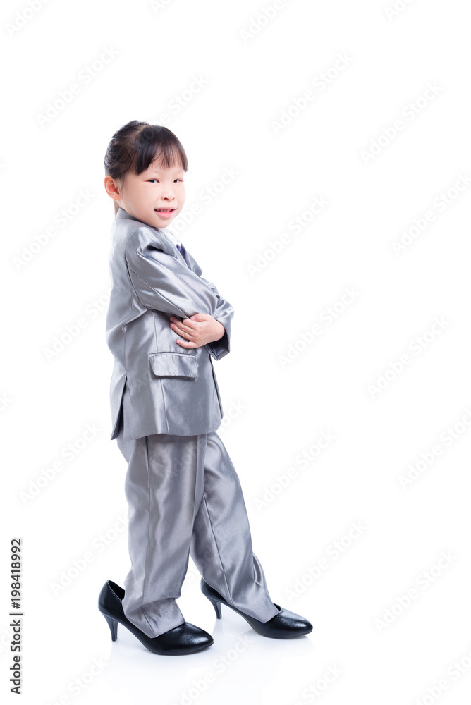 Little Asian Girl Wearing Suit And Big High Heel Shoes Standing Over White Background Stock Photo Adobe Stock Little Asian Girl Wearing Suit And Big High Heel Shoes Standing Over White Background Stock Photo Adobe Stock