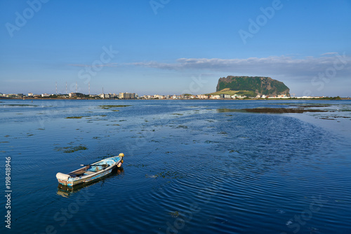Seongsan Ilchulbong with a boat in Jeju