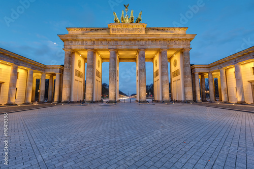 The illuminated Brandenburg Gate in Berlin, Germany, before sunrise
