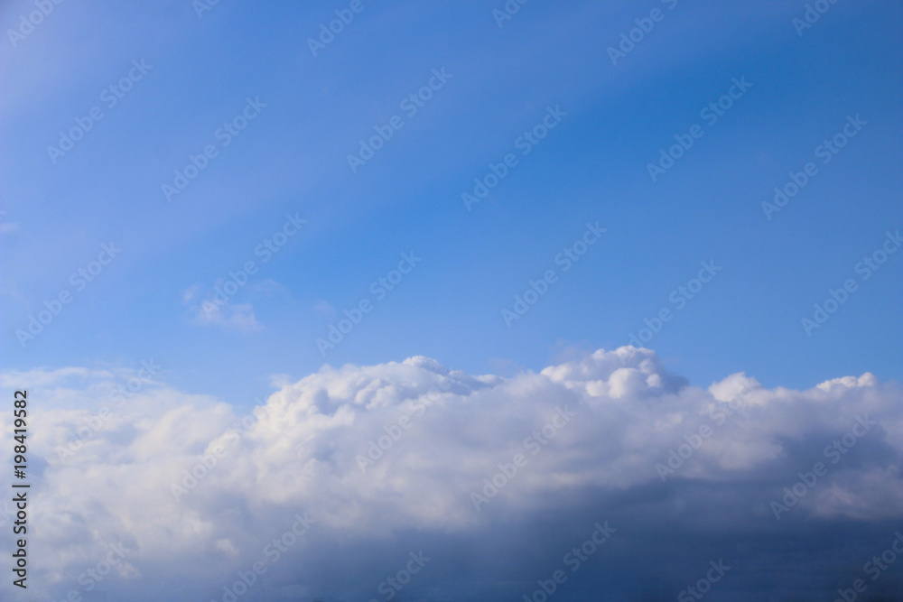 Spring. blue sky with fluffy white clouds. sun, sunlight, clouds, sky - spring changeable weather. Spring. blue sky with fluffy white clouds. sun, sunlight, clouds, sky - spring changeable weather.