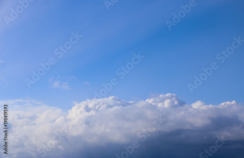 Fototapeta Naklejka Na Ścianę i Meble -  Spring. blue sky with fluffy white clouds. sun, sunlight, clouds, sky - spring changeable weather.