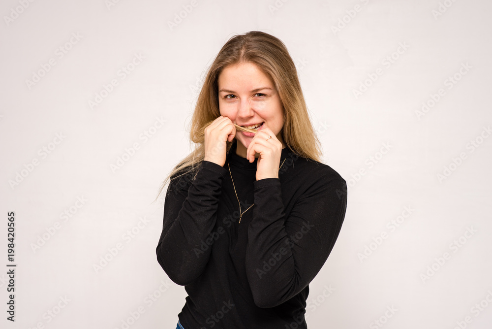 beautiful girl in different poses shows different emotions on different backgrounds in different clothes beautiful girl in different poses shows different emotions on different backgrounds in different clothes