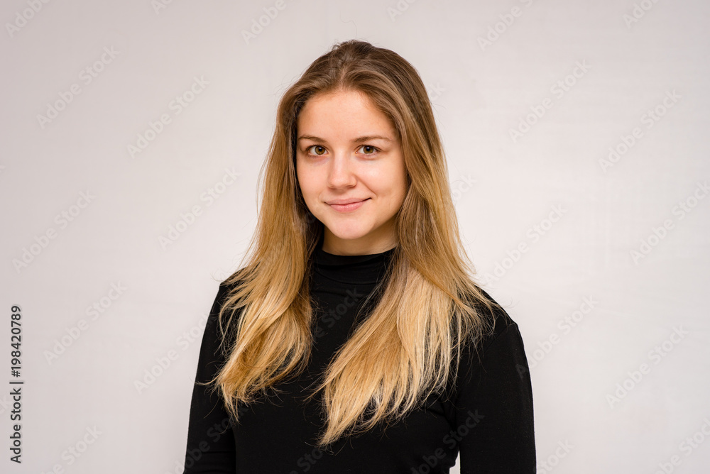 beautiful girl in different poses shows different emotions on different backgrounds in different clothes