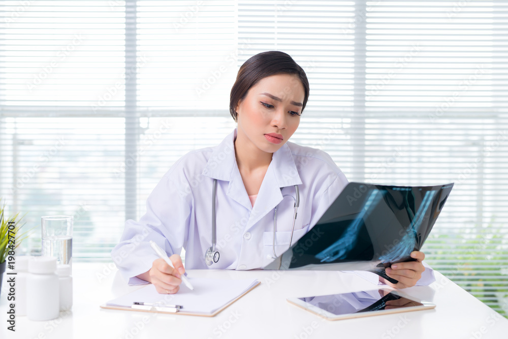 Medical asian doctor working with hologram interface at hospital Medical asian doctor working with hologram interface at hospital