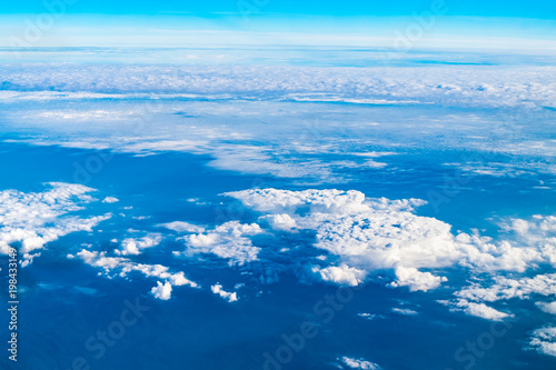 Fototapeta Naklejka Na Ścianę i Meble -  Blue sky and Cloud Top view from airplane window,Nature background
