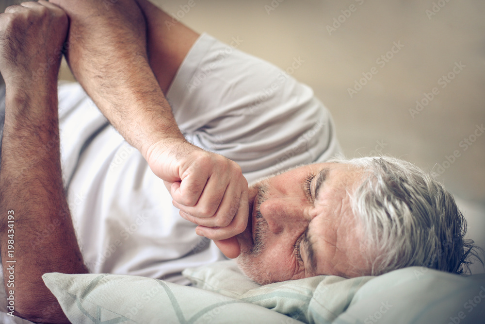 Sick senior man in bed. Sick senior man in bed.