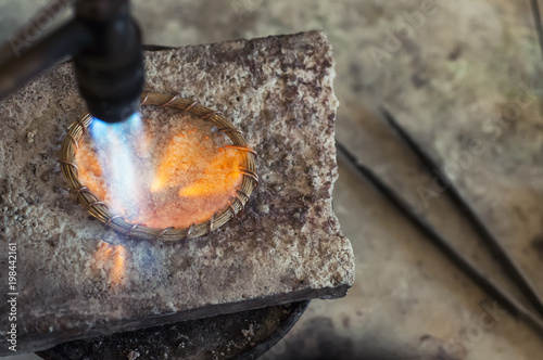 Craft jewelery making with flame torch