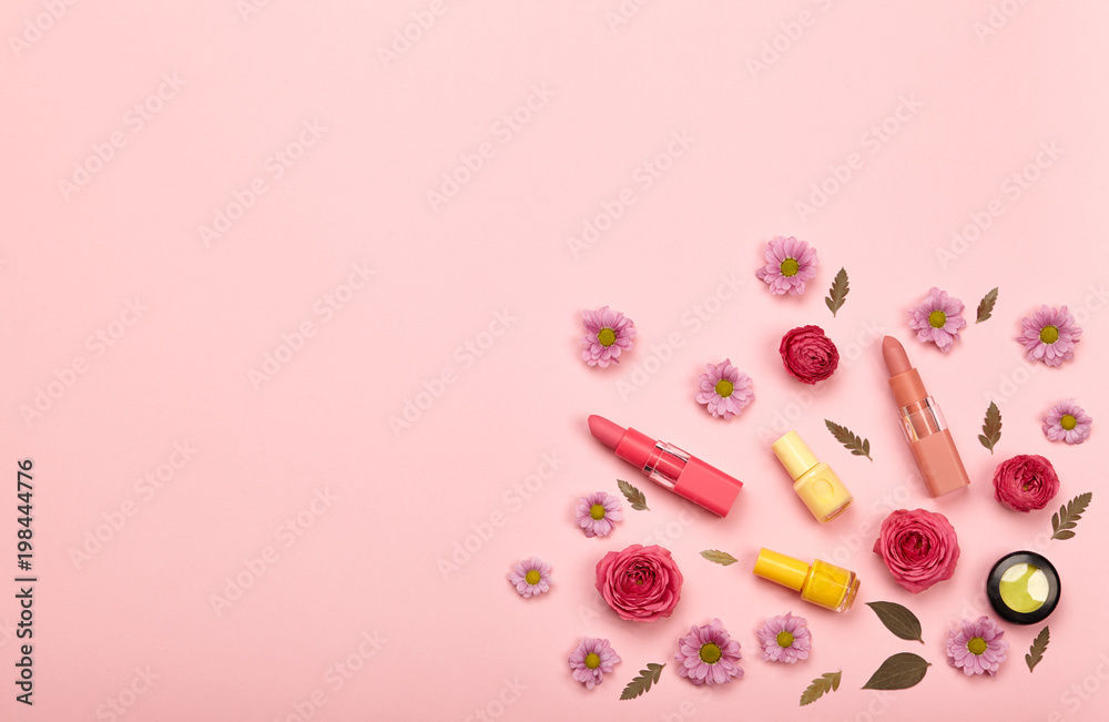 Fototapeta premium Fashionable Women's Cosmetics and Accessories. Falt Lay. Nail Polish and Lipstick. Beautiful Roses Flower. Make Up Cosmetic items Top View